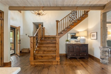 Experience breathtaking long-range mountain views and a serene on Sapphire National Golf Club in North Carolina - for sale on GolfHomes.com, golf home, golf lot
