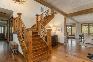 Experience breathtaking long-range mountain views and a serene on Sapphire National Golf Club in North Carolina - for sale on GolfHomes.com, golf home, golf lot