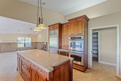 Incredible opportunity to own a spacious 4-bedroom plus on Country Club of Coral Springs in Florida - for sale on GolfHomes.com, golf home, golf lot