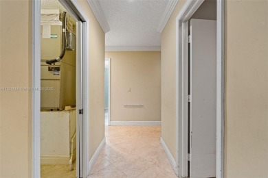 Incredible opportunity to own a spacious 4-bedroom plus on Country Club of Coral Springs in Florida - for sale on GolfHomes.com, golf home, golf lot