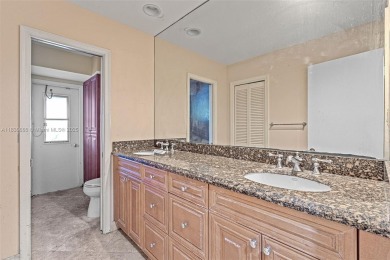 Incredible opportunity to own a spacious 4-bedroom plus on Country Club of Coral Springs in Florida - for sale on GolfHomes.com, golf home, golf lot