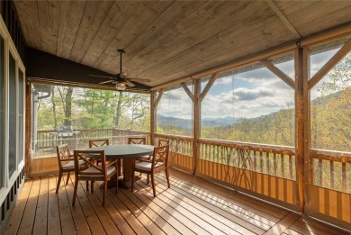 Experience breathtaking long-range mountain views and a serene on Sapphire National Golf Club in North Carolina - for sale on GolfHomes.com, golf home, golf lot