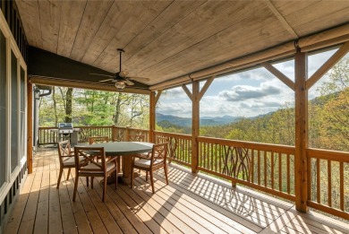 Experience breathtaking long-range mountain views and a serene on Sapphire National Golf Club in North Carolina - for sale on GolfHomes.com, golf home, golf lot