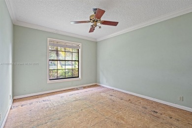 Incredible opportunity to own a spacious 4-bedroom plus on Country Club of Coral Springs in Florida - for sale on GolfHomes.com, golf home, golf lot