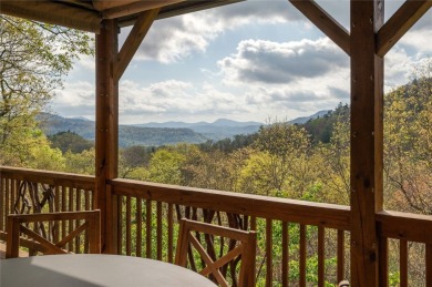 Experience breathtaking long-range mountain views and a serene on Sapphire National Golf Club in North Carolina - for sale on GolfHomes.com, golf home, golf lot