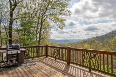 Experience breathtaking long-range mountain views and a serene on Sapphire National Golf Club in North Carolina - for sale on GolfHomes.com, golf home, golf lot