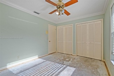 Incredible opportunity to own a spacious 4-bedroom plus on Country Club of Coral Springs in Florida - for sale on GolfHomes.com, golf home, golf lot