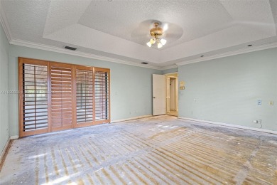 Incredible opportunity to own a spacious 4-bedroom plus on Country Club of Coral Springs in Florida - for sale on GolfHomes.com, golf home, golf lot
