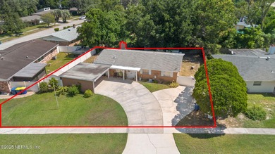 MOTIVATED SELLER! Welcome HOME! This 3 bedroom, 2 bath BRICK on Blue Cypress Golf Club in Florida - for sale on GolfHomes.com, golf home, golf lot