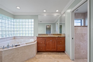 Incredible opportunity to own a spacious 4-bedroom plus on Country Club of Coral Springs in Florida - for sale on GolfHomes.com, golf home, golf lot