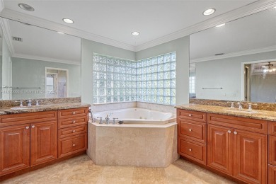 Incredible opportunity to own a spacious 4-bedroom plus on Country Club of Coral Springs in Florida - for sale on GolfHomes.com, golf home, golf lot