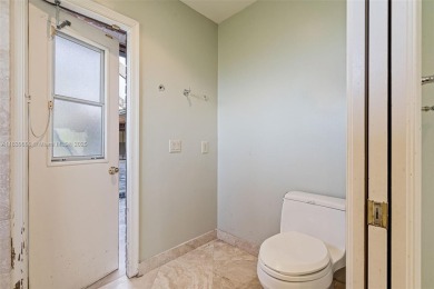 Incredible opportunity to own a spacious 4-bedroom plus on Country Club of Coral Springs in Florida - for sale on GolfHomes.com, golf home, golf lot