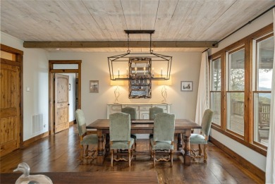 Experience breathtaking long-range mountain views and a serene on Sapphire National Golf Club in North Carolina - for sale on GolfHomes.com, golf home, golf lot