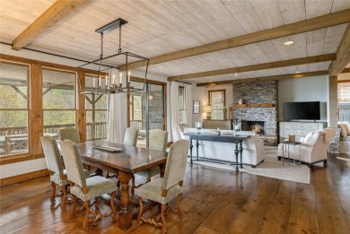 Experience breathtaking long-range mountain views and a serene on Sapphire National Golf Club in North Carolina - for sale on GolfHomes.com, golf home, golf lot