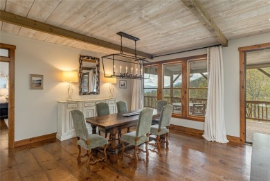 Experience breathtaking long-range mountain views and a serene on Sapphire National Golf Club in North Carolina - for sale on GolfHomes.com, golf home, golf lot