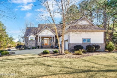 Crafted by the skilled custom home builder Mike Page, this on River Landing Golf Course in North Carolina - for sale on GolfHomes.com, golf home, golf lot