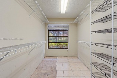 Incredible opportunity to own a spacious 4-bedroom plus on Country Club of Coral Springs in Florida - for sale on GolfHomes.com, golf home, golf lot