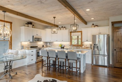 Experience breathtaking long-range mountain views and a serene on Sapphire National Golf Club in North Carolina - for sale on GolfHomes.com, golf home, golf lot