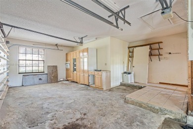 Incredible opportunity to own a spacious 4-bedroom plus on Country Club of Coral Springs in Florida - for sale on GolfHomes.com, golf home, golf lot