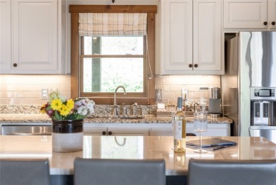 Experience breathtaking long-range mountain views and a serene on Sapphire National Golf Club in North Carolina - for sale on GolfHomes.com, golf home, golf lot