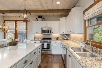 Experience breathtaking long-range mountain views and a serene on Sapphire National Golf Club in North Carolina - for sale on GolfHomes.com, golf home, golf lot