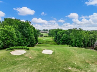 This lovely cottage-style home overlooks the 4th Fairway on on Traditions of Braselton Golf Club in Georgia - for sale on GolfHomes.com, golf home, golf lot