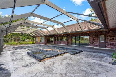 Incredible opportunity to own a spacious 4-bedroom plus on Country Club of Coral Springs in Florida - for sale on GolfHomes.com, golf home, golf lot