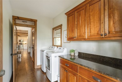 Experience breathtaking long-range mountain views and a serene on Sapphire National Golf Club in North Carolina - for sale on GolfHomes.com, golf home, golf lot