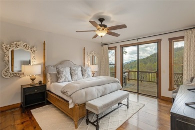 Experience breathtaking long-range mountain views and a serene on Sapphire National Golf Club in North Carolina - for sale on GolfHomes.com, golf home, golf lot