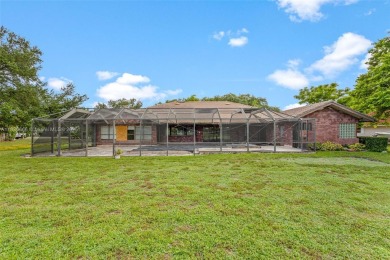 Incredible opportunity to own a spacious 4-bedroom plus on Country Club of Coral Springs in Florida - for sale on GolfHomes.com, golf home, golf lot
