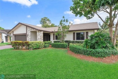 Move-In Ready Updated Immaculate 3-Bedroom, 2.5-Bath Pool Home on Woodmont Country Club in Florida - for sale on GolfHomes.com, golf home, golf lot