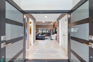 Move-In Ready Updated Immaculate 3-Bedroom, 2.5-Bath Pool Home on Woodmont Country Club in Florida - for sale on GolfHomes.com, golf home, golf lot