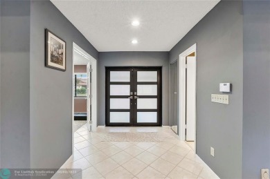 Move-In Ready Updated Immaculate 3-Bedroom, 2.5-Bath Pool Home on Woodmont Country Club in Florida - for sale on GolfHomes.com, golf home, golf lot
