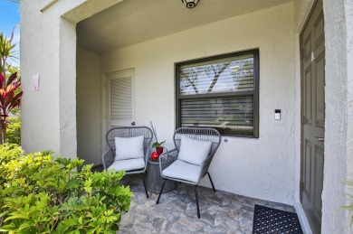 A picture says 1000 words. Elegantly renovated end unit with on Boca Lago Golf and Country Club in Florida - for sale on GolfHomes.com, golf home, golf lot