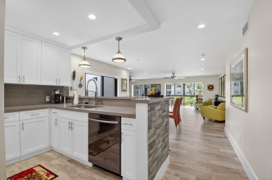 A picture says 1000 words. Elegantly renovated end unit with on Boca Lago Golf and Country Club in Florida - for sale on GolfHomes.com, golf home, golf lot