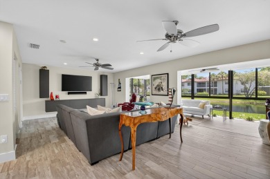 A picture says 1000 words. Elegantly renovated end unit with on Boca Lago Golf and Country Club in Florida - for sale on GolfHomes.com, golf home, golf lot