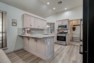 Beautifully updated home nestled in a quiet area with golf on Pheasant Run in Oklahoma - for sale on GolfHomes.com, golf home, golf lot