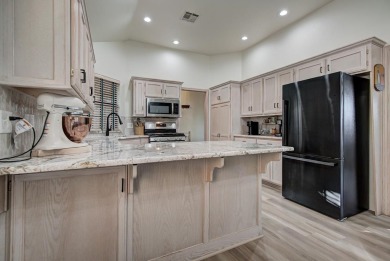 Beautifully updated home nestled in a quiet area with golf on Pheasant Run in Oklahoma - for sale on GolfHomes.com, golf home, golf lot