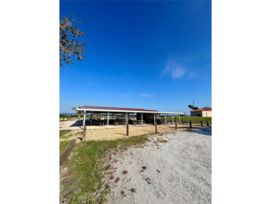 Country living at its finest on this half acre lot in this gated on Indian Lake Estates Golf and Country Club in Florida - for sale on GolfHomes.com, golf home, golf lot