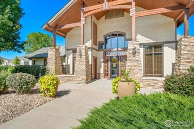 Welcome to this stunning Summer Park end-unit, ground-floor on Boomerang Links in Colorado - for sale on GolfHomes.com, golf home, golf lot