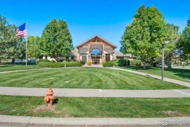 Welcome to this stunning Summer Park end-unit, ground-floor on Boomerang Links in Colorado - for sale on GolfHomes.com, golf home, golf lot