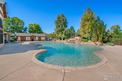 Welcome to this stunning Summer Park end-unit, ground-floor on Boomerang Links in Colorado - for sale on GolfHomes.com, golf home, golf lot