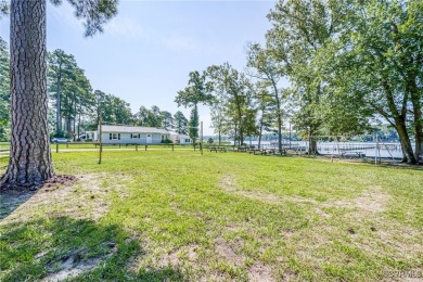 Welcome to 87 Columbine Drive-an updated coastal retreat in the on Piankatank River Golf Club in Virginia - for sale on GolfHomes.com, golf home, golf lot