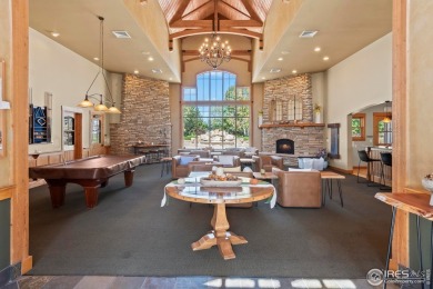 Welcome to this stunning Summer Park end-unit, ground-floor on Boomerang Links in Colorado - for sale on GolfHomes.com, golf home, golf lot