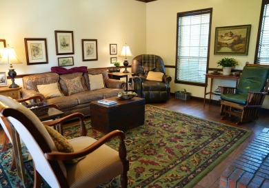 Discover the charm of this spacious 3050 sq ft executive brick on Quail Hallow Golf Course in Mississippi - for sale on GolfHomes.com, golf home, golf lot