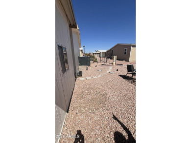 Looking for a ground set with everything done for you? This is on Sun City Riverview Golf Course in Arizona - for sale on GolfHomes.com, golf home, golf lot