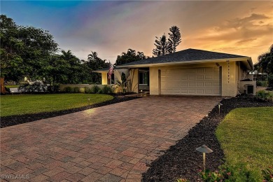 Welcome to waterfront living at its finest! Strategically on Whiskey Creek Country Club in Florida - for sale on GolfHomes.com, golf home, golf lot