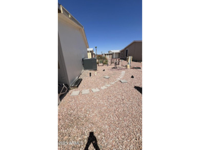 Looking for a ground set with everything done for you? This is on Sun City Riverview Golf Course in Arizona - for sale on GolfHomes.com, golf home, golf lot