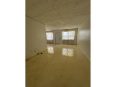 NO AGE RESTRICTION IN THIS BUILDING, WASHER AND DRYER INSIDE on The American Golf Club in Florida - for sale on GolfHomes.com, golf home, golf lot