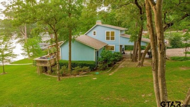 Welcome to your dream home in the serene community of Hideaway on Hide-A-Way Lake Golf Course in Texas - for sale on GolfHomes.com, golf home, golf lot